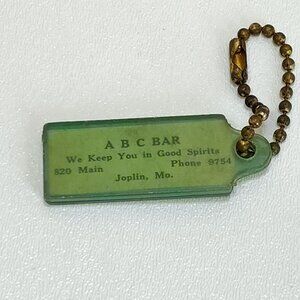Advertising Keychain ABC Bar Joplin Mo "We Keep You in Good Spirits" Phone: 9754
